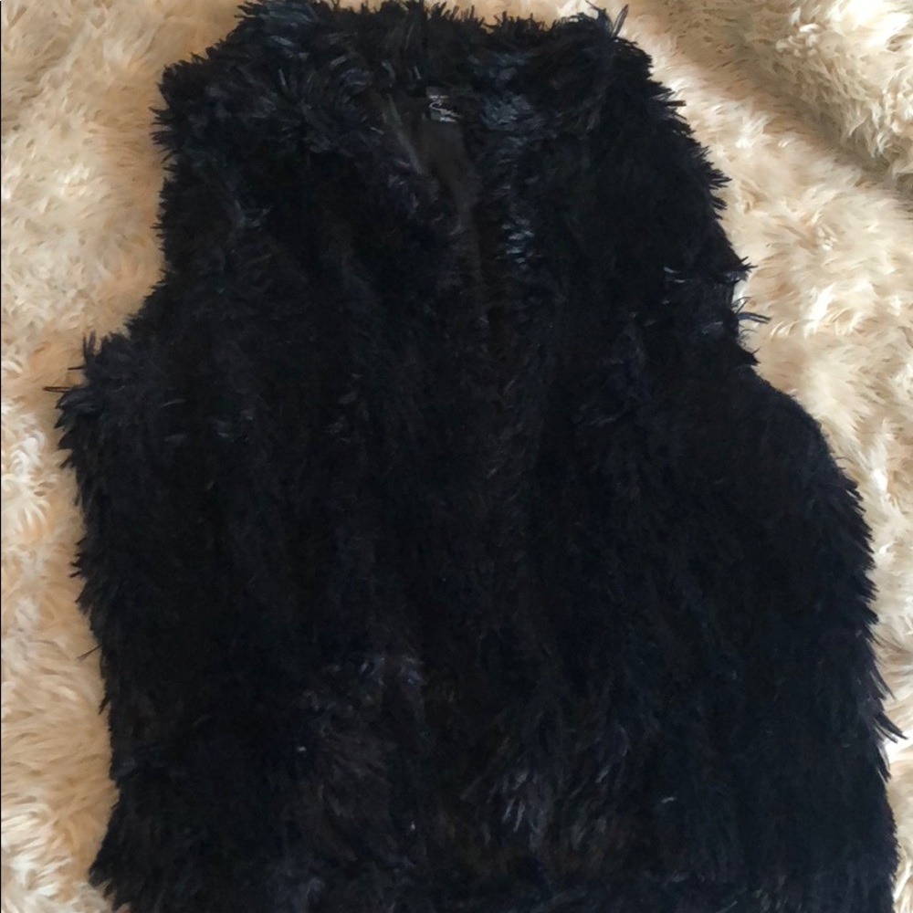 Black faux fur vest